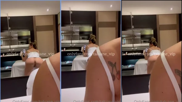 Snuane filming the naked button in the mirror