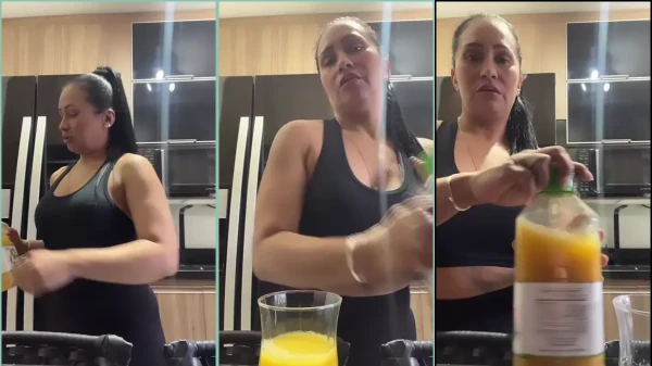 Alessandra Marques in the house kitchen filming her daily life