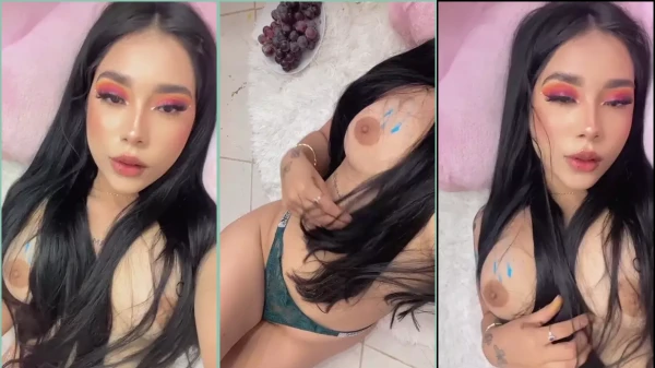 Round mia sitting with the outstanding tits