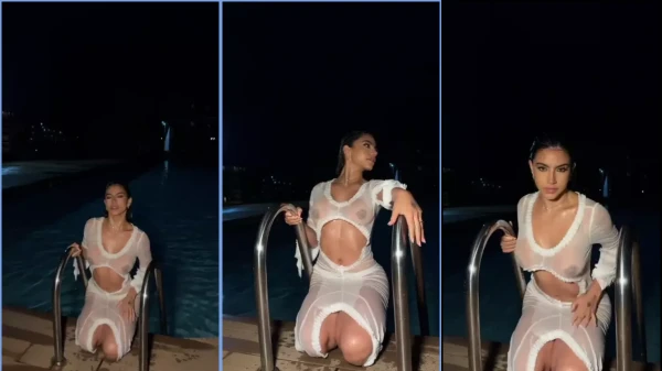 Laura Vanegas in the pool all wet