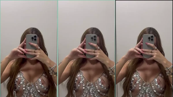 Nayara Macedo filming her body with cell phone