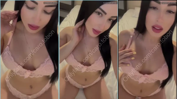 Carolina Tobon all smiling dressed in a sexy lingerie